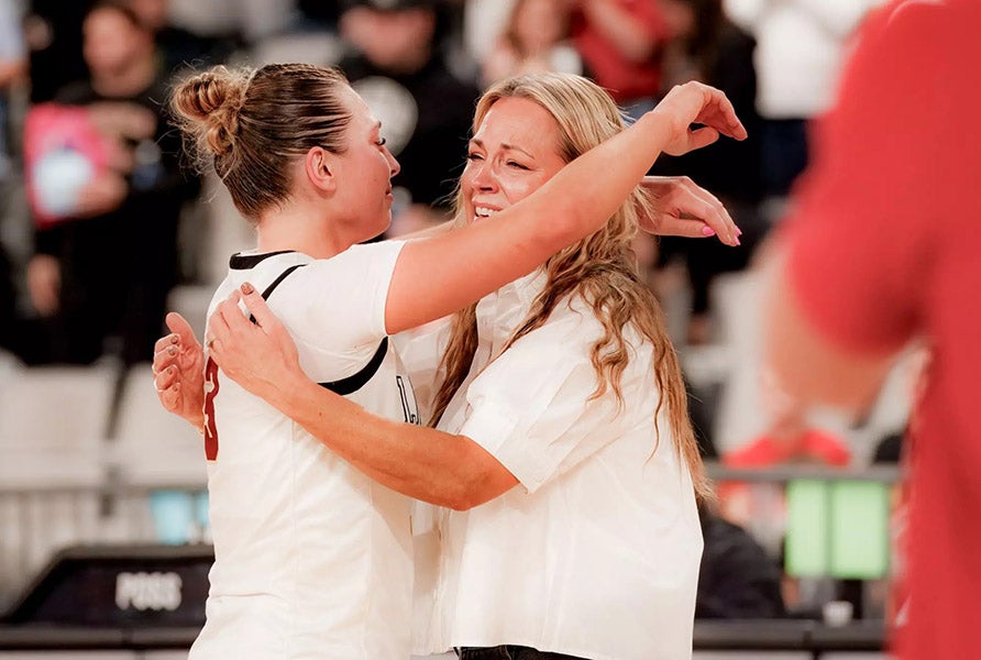 MaxPreps Oklahoma Player of the Year Maddi Stewart shares a moment with her mom and Lincoln Christian head coach Melody in the closing moments of their state championship win. (PHOTO: Lincoln Christian Athletics)
