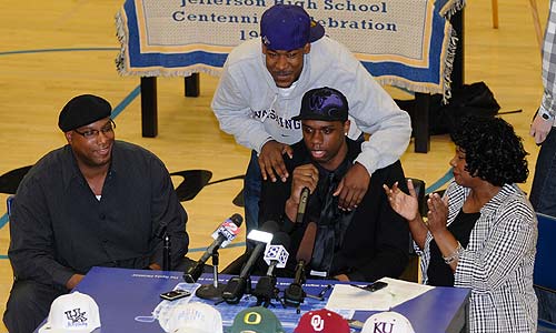 Terrence Ross embraces Terrence Jones following their joint announcement Friday afternoon.