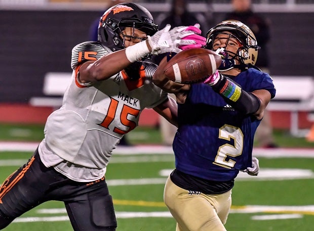 Mater Dei Catholic's Chris Snyder tries for a catch in the Crusaders' 26-18 win over McClymonds in the CIF Division 2-AA finals at Saddleback College. (Photo: Louis Lopez)