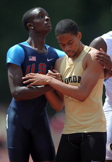 Aldrich Bailey (left) and Arman Hall
share a moment after the USA Junior
National finals at Indiana University
on Sunday.