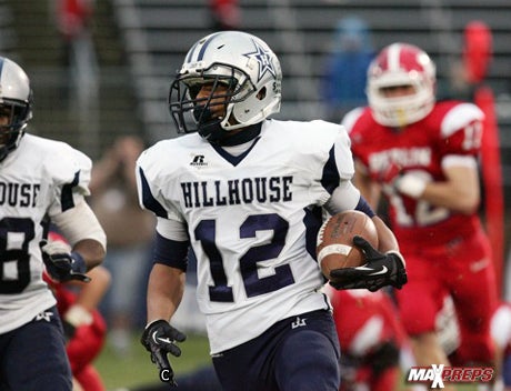 Daryn Horner carries for Hillhouse during Saturday's CIAC Class M final.