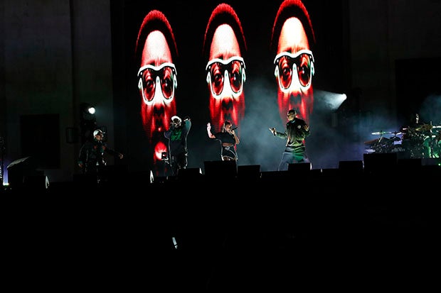 The Black Eyed Peas performed Friday at halftime of the East L.A. Classic high school football game between Roosevelt and Garfield. Group leader will.i.am grew up in nearby Boyle Heights and wanted to give back to his community with the show. (Photo: Rene Morales)