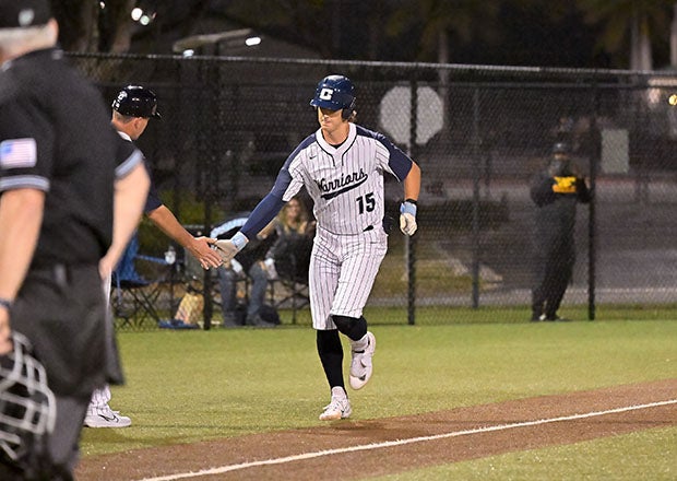 Liam Peterson of new No. 1 Calvary Christian (Clearwater, Fla.) rounds third after hitting a home run during a game in February. (Photo: Sheila Haddad)