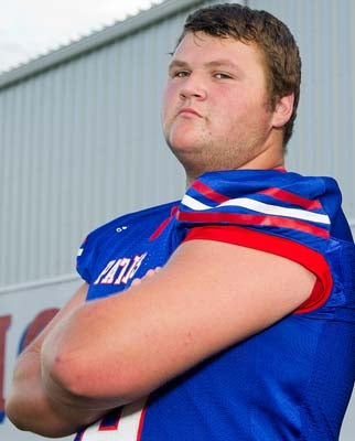 Anthony Taylor is a large young man, and his task will beto open holes for the speedsters to run through.