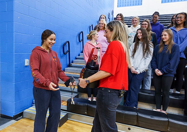 Sophee Peterson was surprised with the Gatorade National Volleyball Player of the Year trophy by Olympian April Ross on Thursday at Byron Nelson High School. (PHOTO: Michael Horbovetz)
