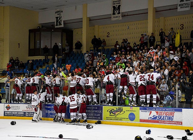 Morristown (N.J.) players celebrate with their fans after winning the Mennen Cup.
