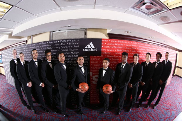 Allocco's West team posing before a formal dinner the night before the big game. 