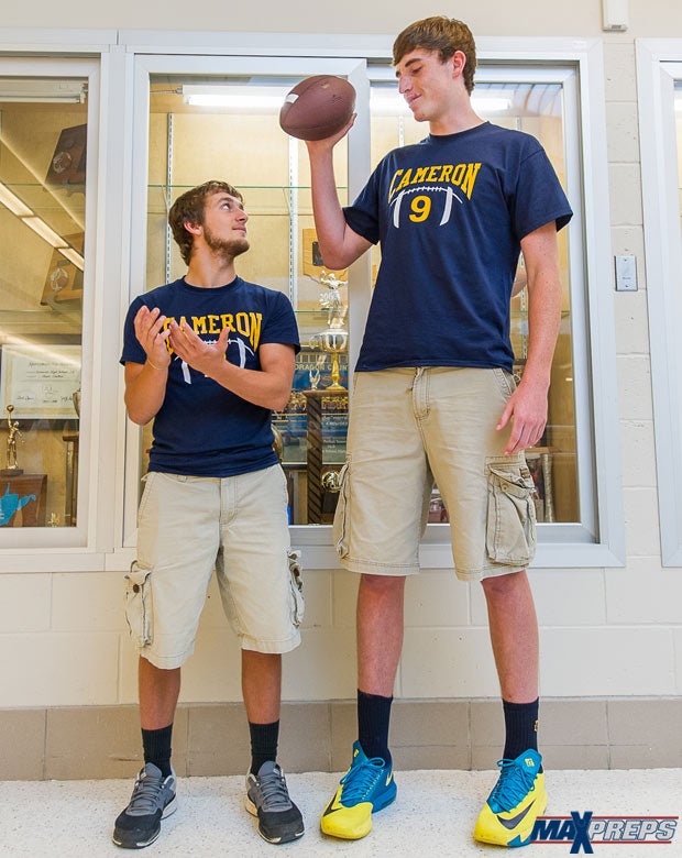 6-foot-11 high school quarterback Logan Routt towers over