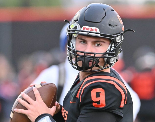 Quarterback Teddy Booras has a fierce competitive edge, said his coach.