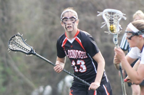 Posey Valis and the McDonogh girls lacrosse team overcame a pregame speech by Ray Lewis to its opponent and a deficit to post its 91st-straight win and fourth-straight national title.