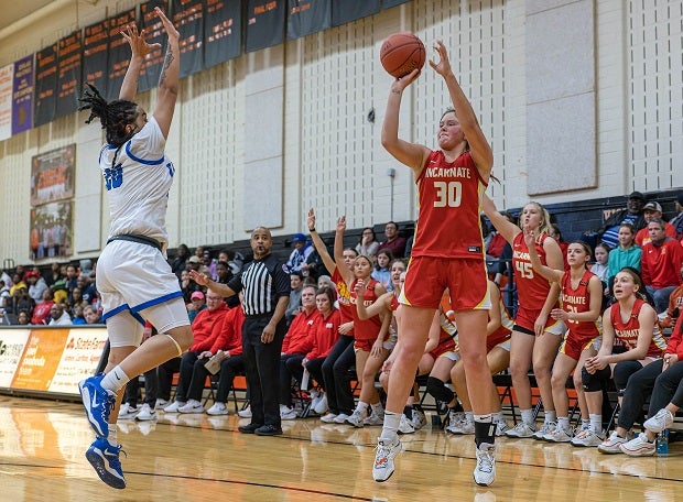 Brooke Coffey goes up for three in Incarnate Word Academy's 72-61 win over Vashon at the Webster Winter Challenge. The Red Knights own the nation's longest win streak at 88 games. (Photo: Jimmy Simmons)