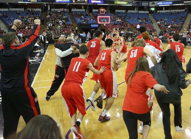 Mater Dei rushes the court in celebration after defeating Bishop O'Dowd 71-61 in California's Open Division state championship game.