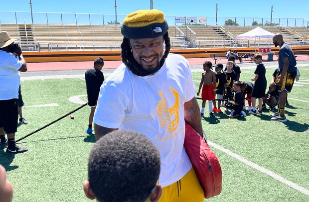 Marshawn Lynch had a lot of fun with the kids on Saturday at Antioch High School. 