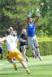 JW North 6-3 tight end Marcus Baugh
goes up high for a pass from QB
Christian Hackenberg for Team Alpha
Speed on Saturday.  