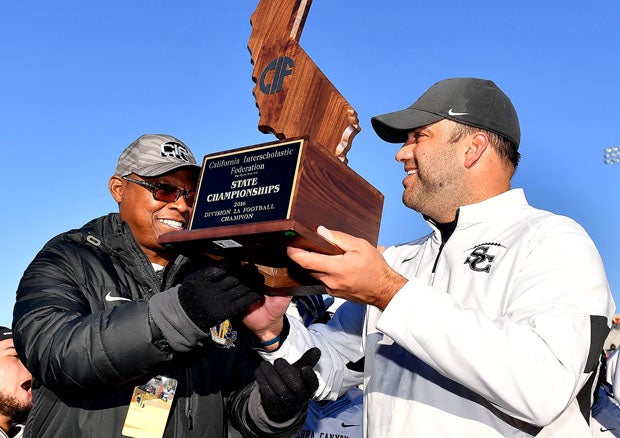 Sierra Canyon coach Jon Ellinghouse with championship trophy. 