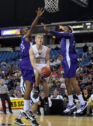 O'Dowd's Anders Haas goes up and under.
