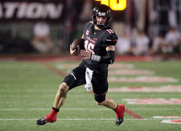 Lake Travis quarterback Charlie Brewer breaks into the open.