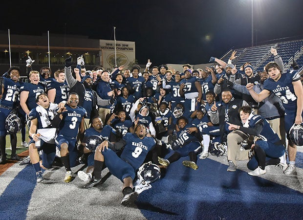 Marietta players and coaches celebrate their victory in Las Vegas.