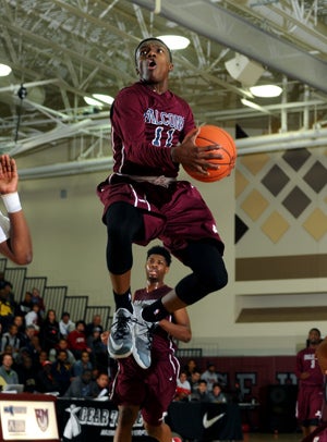 Jared Harper (11) went for 16 points Saturday,
some quite spectacularly. 