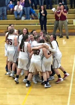 The Dayton girls celebrate shortly after their win
over Salem Academy.