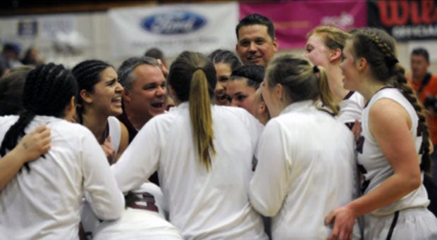 In team huddle before big celebration.