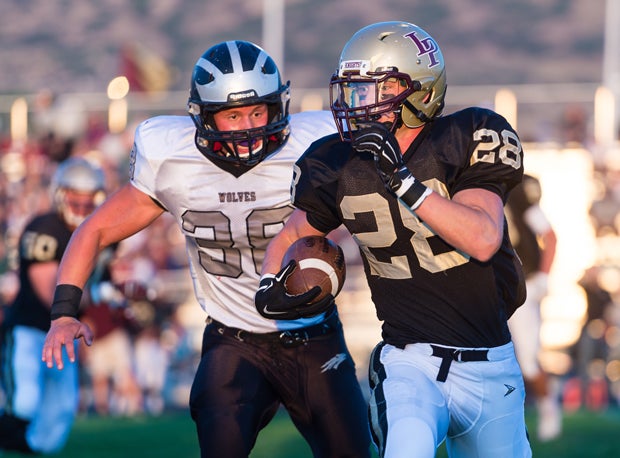 Riverton's Simeon Page, trailing, is making massive impressions with his work at middle linebacker.