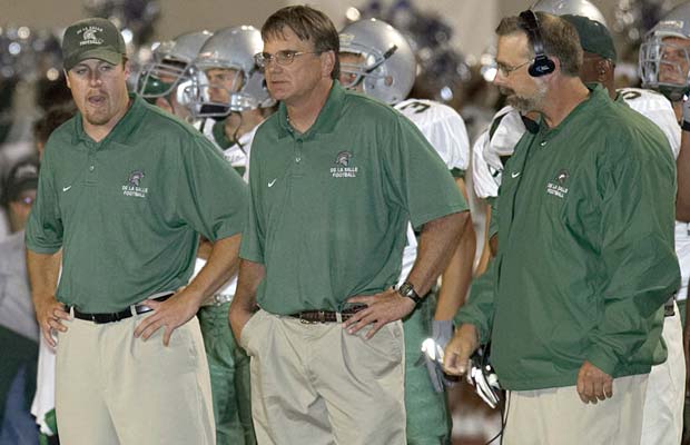 Ladouceur stands among his assistant coaches during a game at Clovis West in 2005.