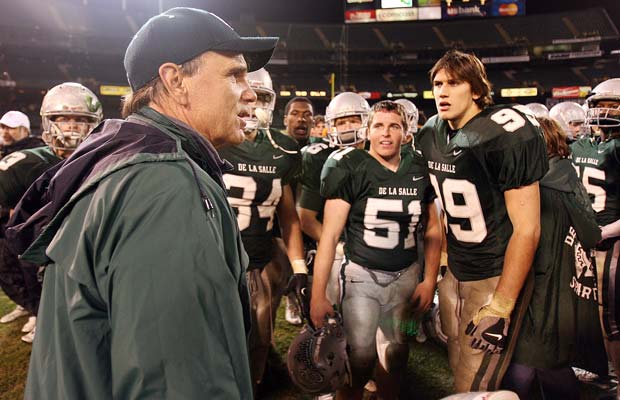 Ladouceur is surrounded by his players following their 2006 victory over Foothill in the North Coast Section 4A championship game at the Oakland Coliseum.