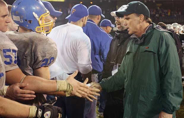 Ladouceur shakes hands with Foothill players following the Spartans' 2007 victory in the North Coast Section 4A championship game at the Oakland Coliseum.