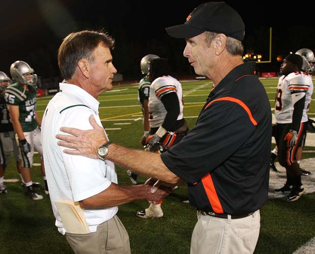 Ladouceur meets with Lakeland (Fla.) head coach Bill Castle following the Spartans' loss in a 2009 game at Diablo Valley College.