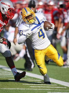 Grant's Isaiah Adams ran hard, rushed
for 44 yards and caught a TD pass.
