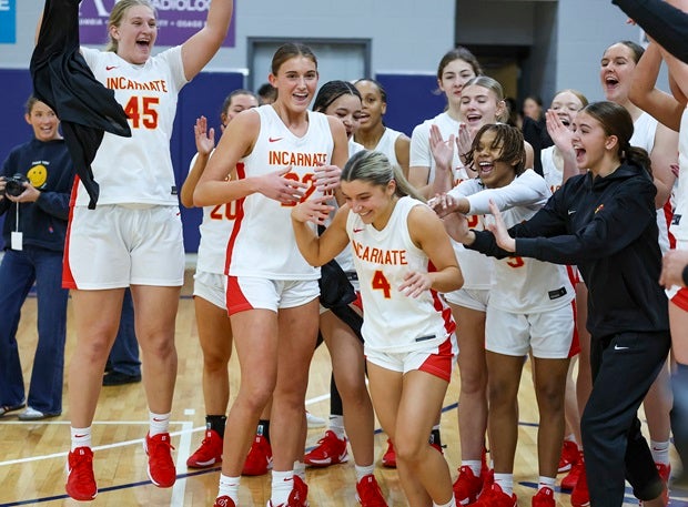 Incarnate Word Academy cheers junior Addi Owen for being named game MVP in the Red Knights' 68-51 win Saturday over Blue Valley North. It was the 139th straight victory for the program dating back to 2020 and set the mark for most consecutive wins. (Photo: Marty Beck)