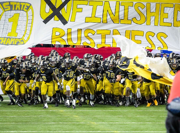 Colquitt County takes the field before the 2014 Georgia 6A title game.
