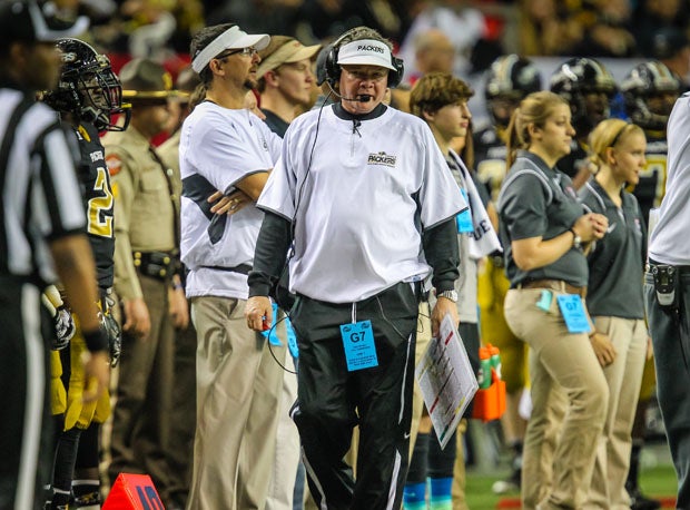Rush Propst strolls the sideline during the 2014 6A state title game. 