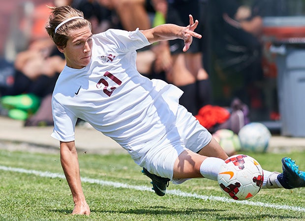 Will Arrowood of Dobyns-Bennett (Tenn.) makes a diving save to keep the ball in play against Maryville in the TSSAA Class AAA Sectional playoffs.