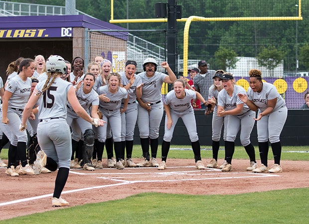 Northwest Rankin (Miss.) players celebrate a home run against Desoto Central during a game in the MHSAA 6A Final Four.
