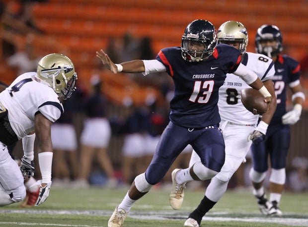 Tua Tagovailoa almost displaying the Heisman Trophy pose while at St. Louis (Honolulu). 