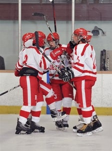 Despite a loss to Ralston Valley, Regis
Jesuit has had a lot to celebrate this
season and is one of the favorites for
the state ice hockey title.