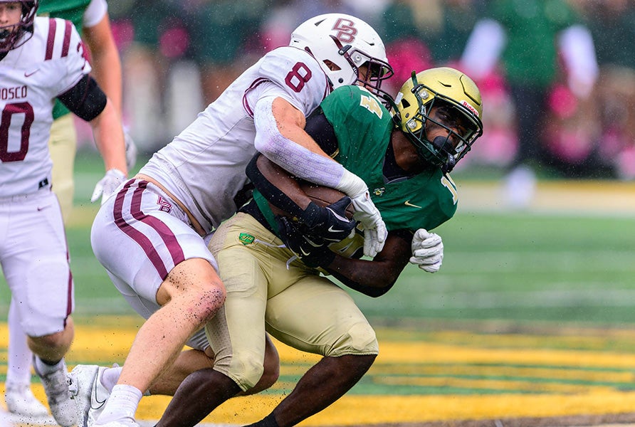 St. Joseph Regional's Aidan O'Neil wraps up Don Bosco Prep's Kyshawn Bryant during the New Jersey Non-Public A state title game last year. The Green Knights and Ironmen will rekindle their rivalry Friday in the MaxPreps Game of the Week. (PHOTO: Pete Hagedoorn)