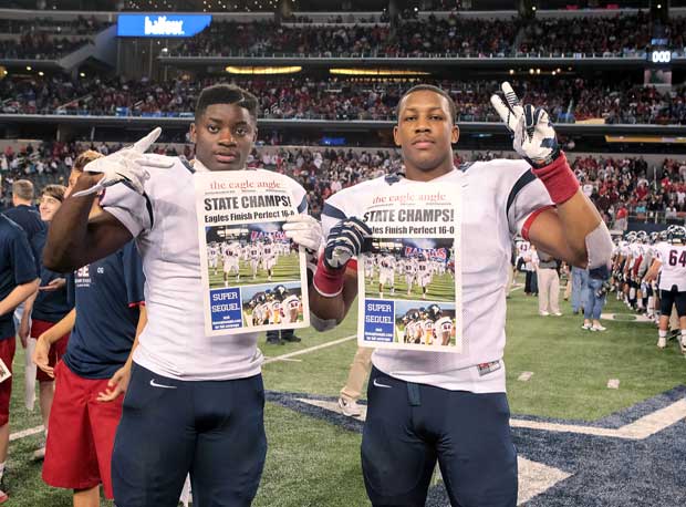Tay Evans and Christian Sam celebrate Allen's state title.