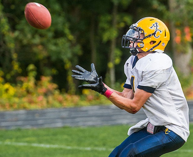Kyle Bairos of Arlington Catholic (Mass.) prepares to catch the ball in last week's game against Austin Prep (Reading, Mass.).