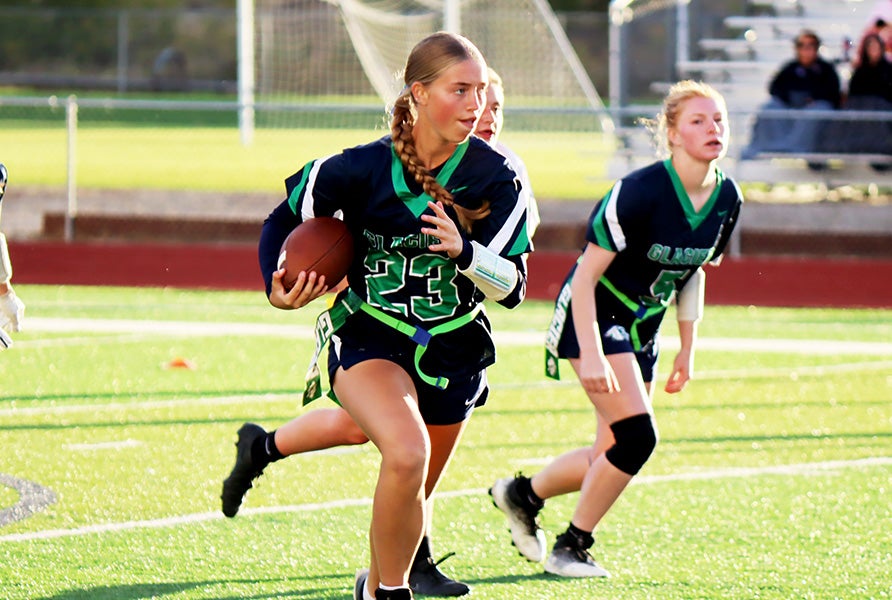 Sophia Frederick heads upfield for Montana powerhouse Glacier, which aims to bring its championship pedigree to the inaugural MaxPreps Flag Football Showdown Sept. 11-12 in San Diego. (PHOTO: GlacierFlagFootball Instagram)