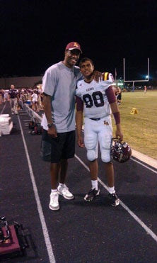 Corey Robinson, right, with his fatherDavid Robinson.