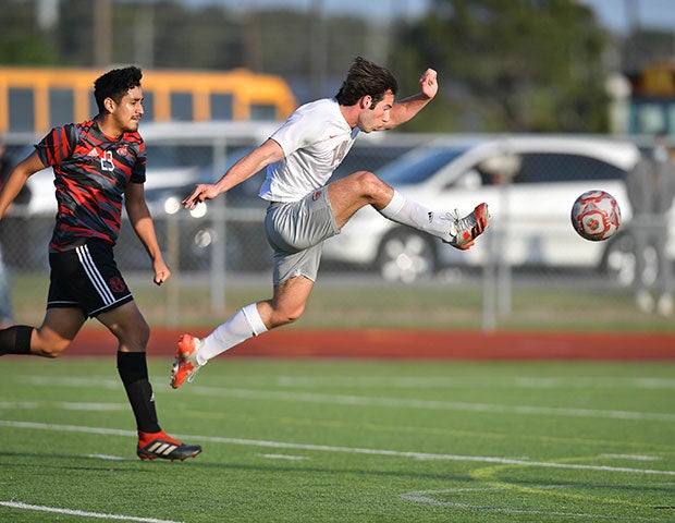 Ethan Armer of Bridgeland (Texas) takes a shot on goal against MacArthur in a UIL 6A Regional quarterfinal playoff  game. 