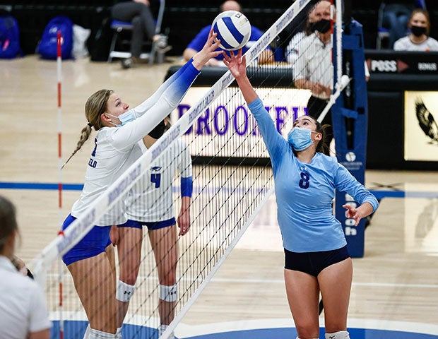 Broomfield’s (Colo.) Courtney Wristen (left) and Ralston Valley’s Audrey Solis battle at the net.  