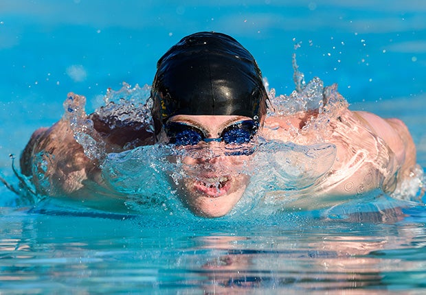 A Folsom (Calif.) swimmer competes in the boys' 100-meter butterfly during a meet against Oak Ridge.