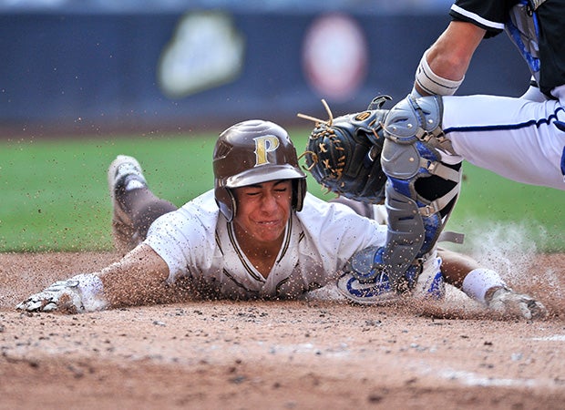 Jimmy Chatfield of Parker (Calif.) is tagged out sliding in to home plate by La Jolla Country Day catcher Ben Petty-Hull.