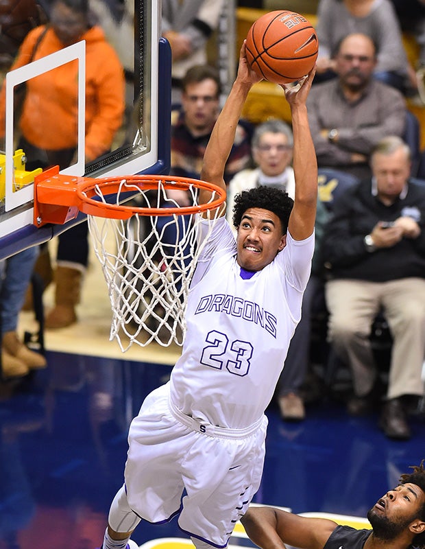 Sacramento (Calif.) guard Christian Terrell soars in for a dunk attempt against Moreau Catholic in the MaxPreps MLK Classic at Haas Pavilion in California.