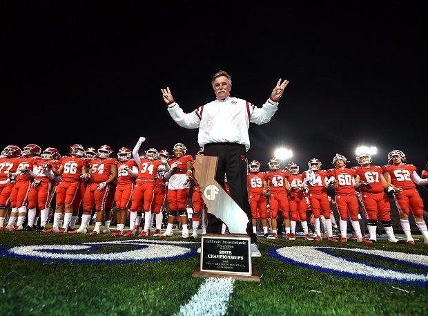 Mater Dei and coach Bruce Rollinson celebrate their 2018 CIF Open Division state title.