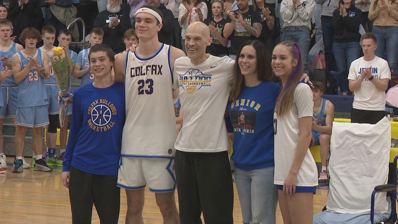 Coach battling cancer makes return